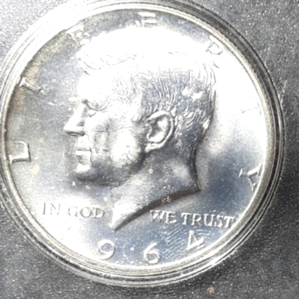 1964 Silver Kennedy accented hair half dollar